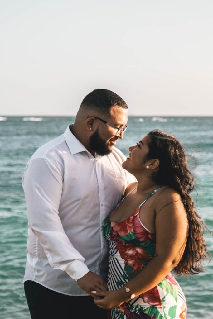pexels-photo-3760524 Photo of Happy Couple Looking at Each Other With Ocean in the Background